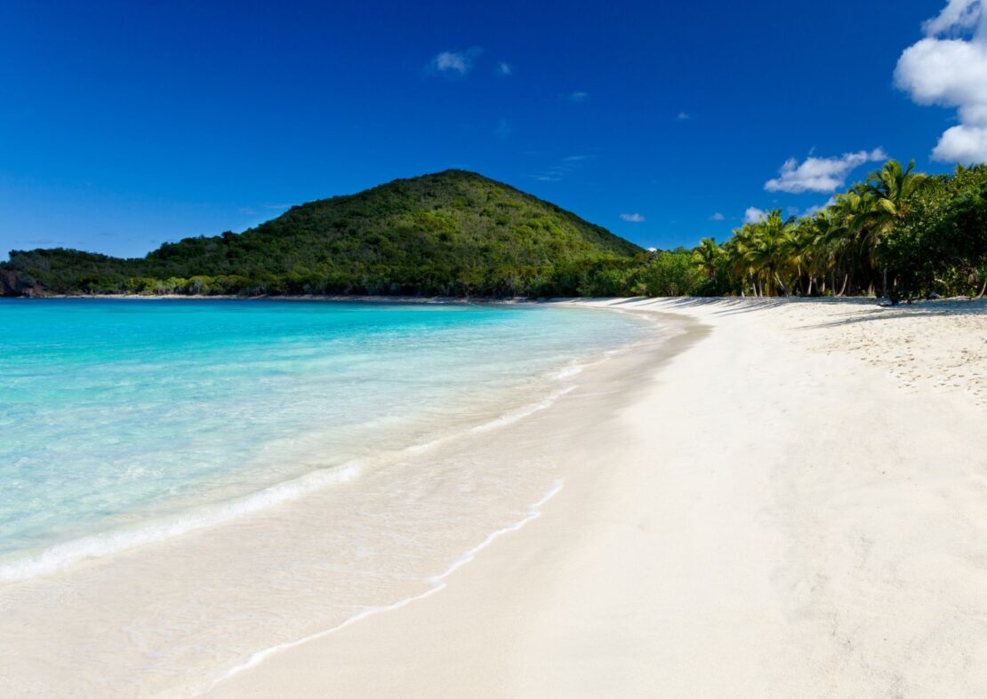white sandy beach of Smuggler’s Cove