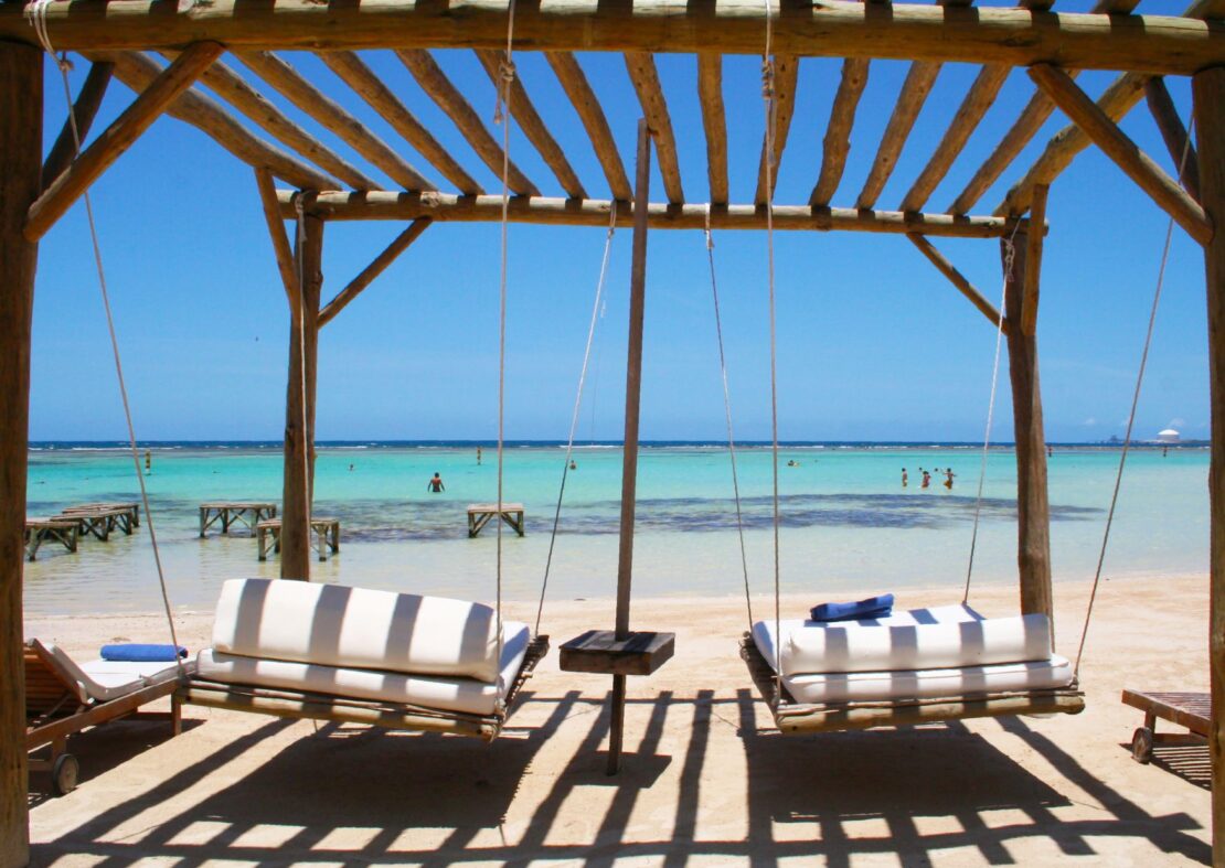 swaying beach chairs on Boca Chica Beach in the Dominican republic 